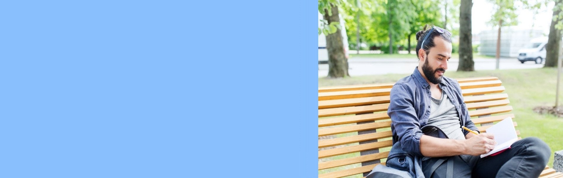 Blue September - Man sits on park bench