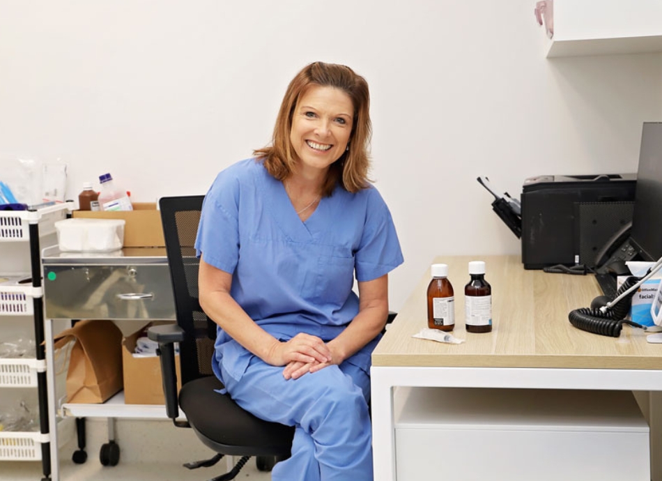 Smiling nurse or healthcare provider wearing scrubs NZ