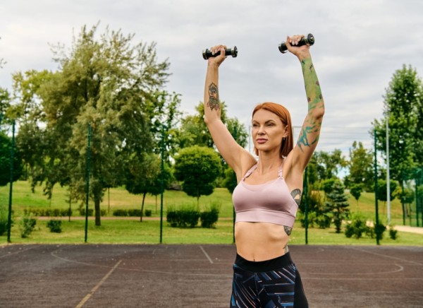 Woman exercising outside wearing supportive sports bra